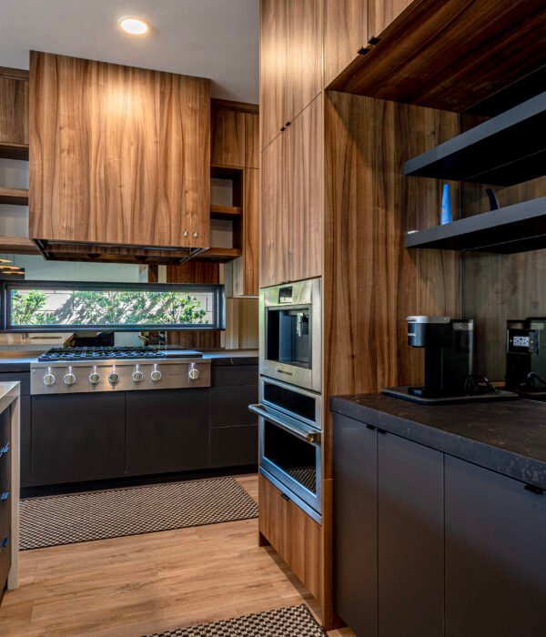 Kitchen countertop featuring Dekton Kelya paired with wood-tone cabinetry.