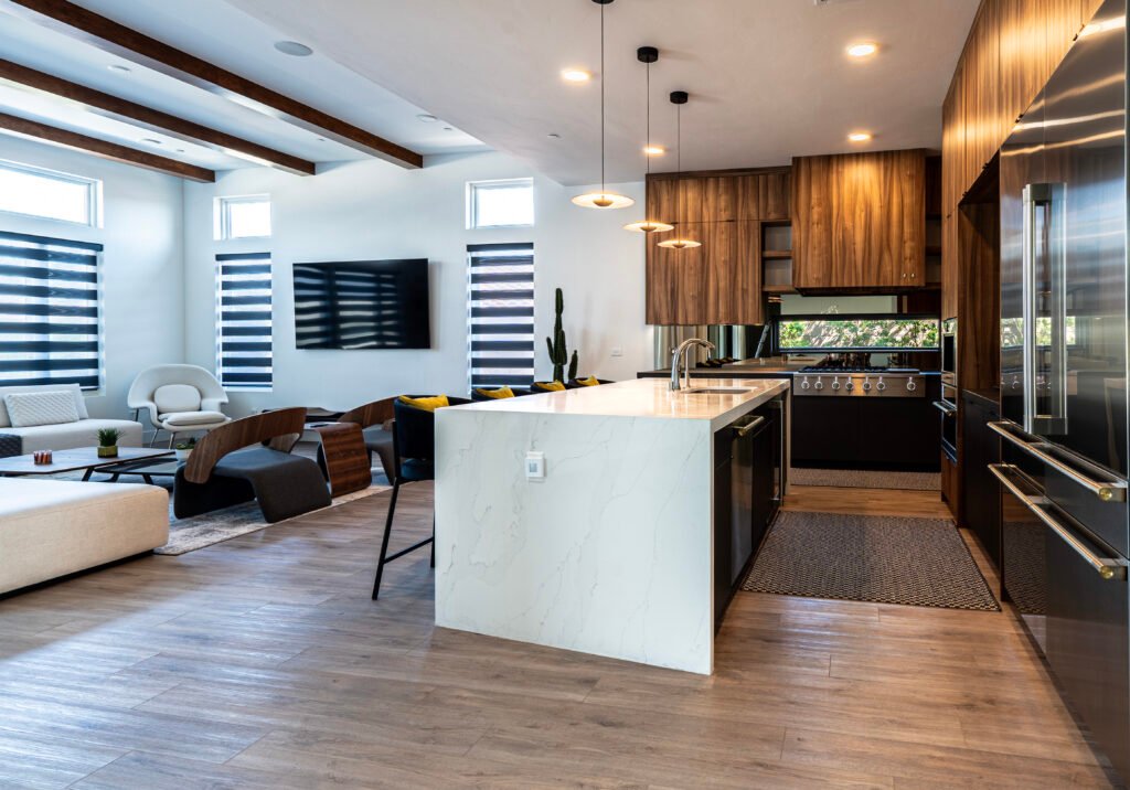 Kitchen countertop featuring Dekton Kelya paired with wood-tone cabinetry.