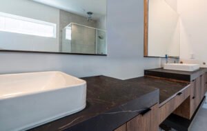 A marble like countertop to compliment the vessel sink