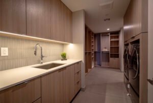 Island Waveline Tile backsplash and Caesarstone Fresh Concrete countertop