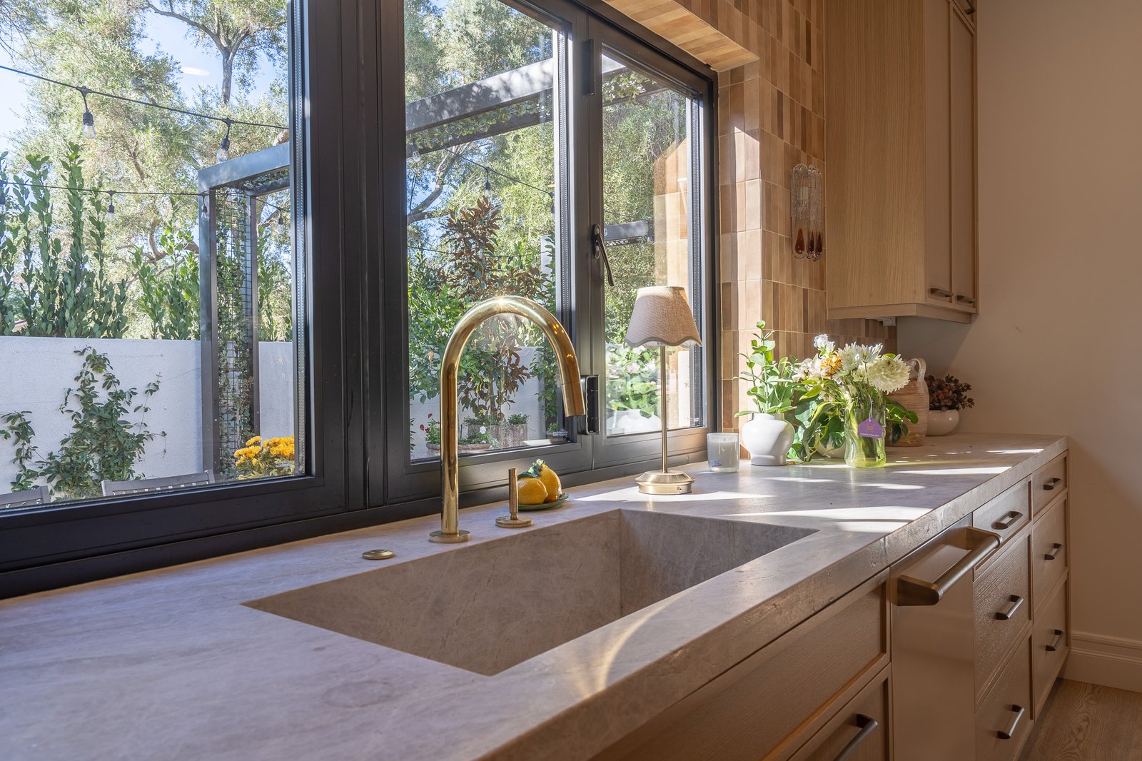 Warm Eclectic Kitchen Remodel by Vegas Granite and Marble project photo 2